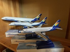 Listing image for Selection of new snap fit Airtours International model aircraft.